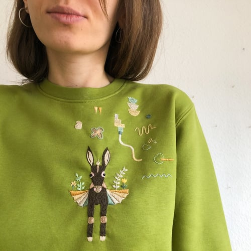 Image of The flying donkey - hand embroidered organic cotton sweatshirt, Unisex