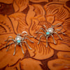 Pair of Sterling Silver with Turquoise Spider Earrings by Zuni Silversmith Albert Pewa