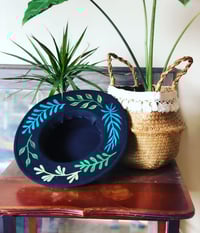 Image 1 of Black Flat Brim Painted Hat 