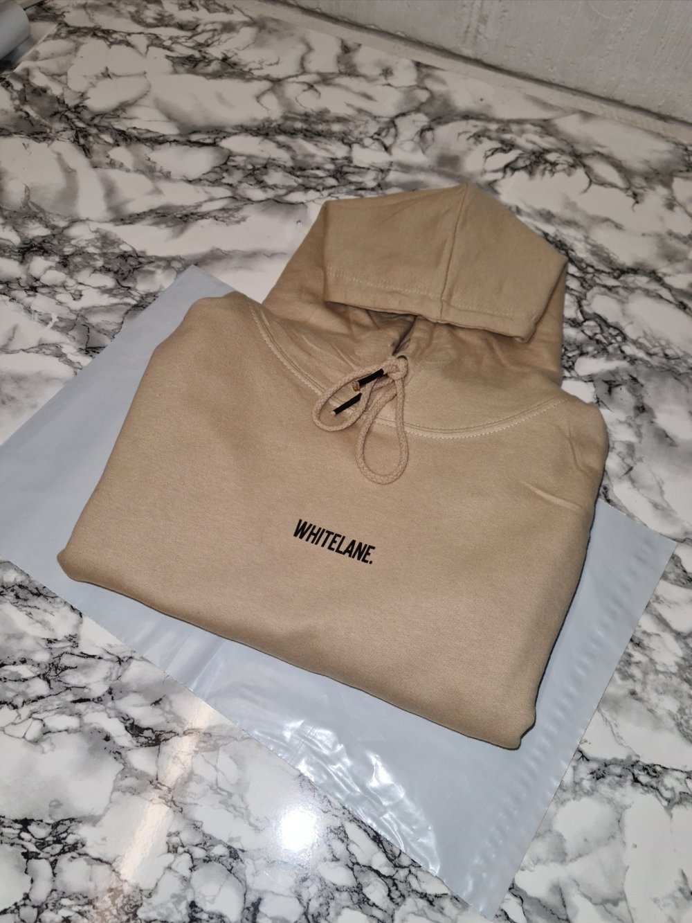 Image of Whitelane. text hoodie