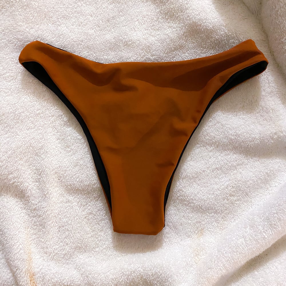 Image of HIGH TIDES : MATTE BRONZE X BLACK
