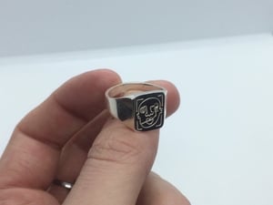 Image of Faces x Sam Ozanne collaborative signet ring.