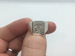 Image of Faces x Sam Ozanne collaborative signet ring.