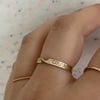 Twisted gold ring with stars 