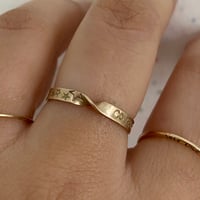 Image 1 of Twisted gold ring with stars 