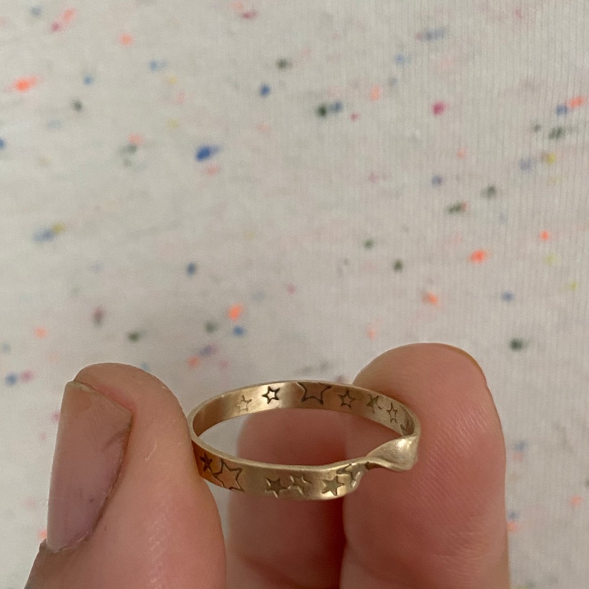 Image of Twisted gold ring with stars 