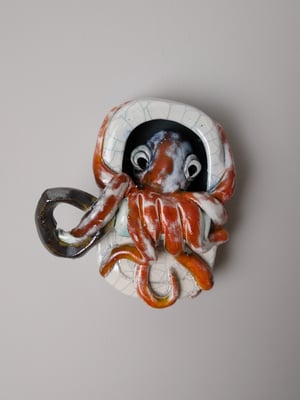 Tin with an Octopus in