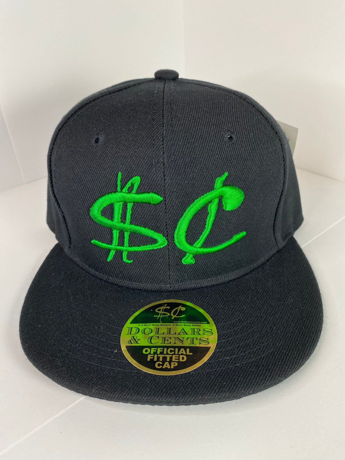 green and black fitted hat