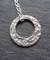 Offset circle hoop pendant