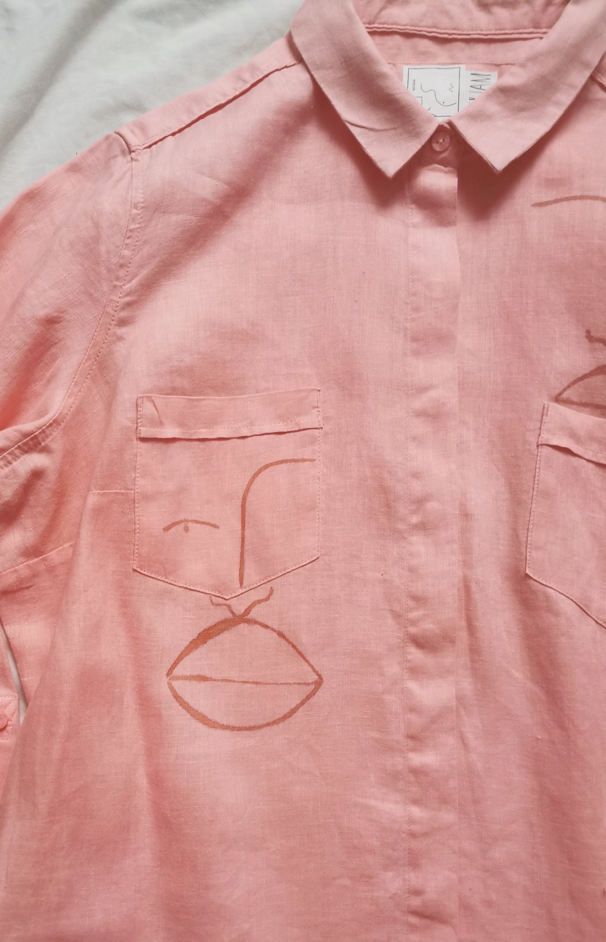 Image of pink ting shirt 