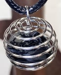 Black Tourmaline Necklace / Pendant In Wrap Around Spiral Cage