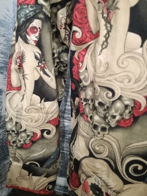 Image of Day of the dead red roses skeletons senioritas