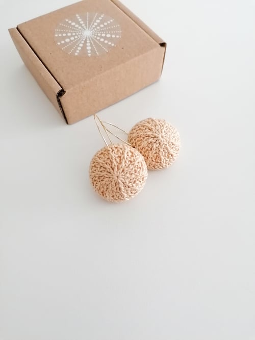 Image of Beige Sea Urchin earrings, golden hoops