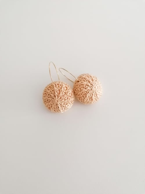 Image of Beige Sea Urchin earrings, golden hoops