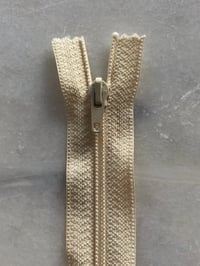 Plastik lynlås 30 cm - gylden elfenben