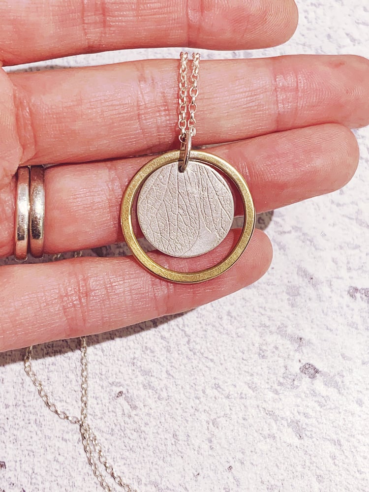 Image of Recycled silver disc and brass ring necklace