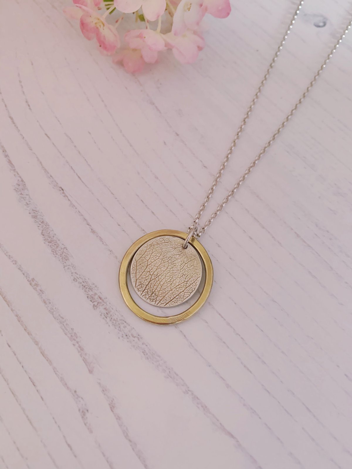 Image of Recycled silver disc and brass ring necklace