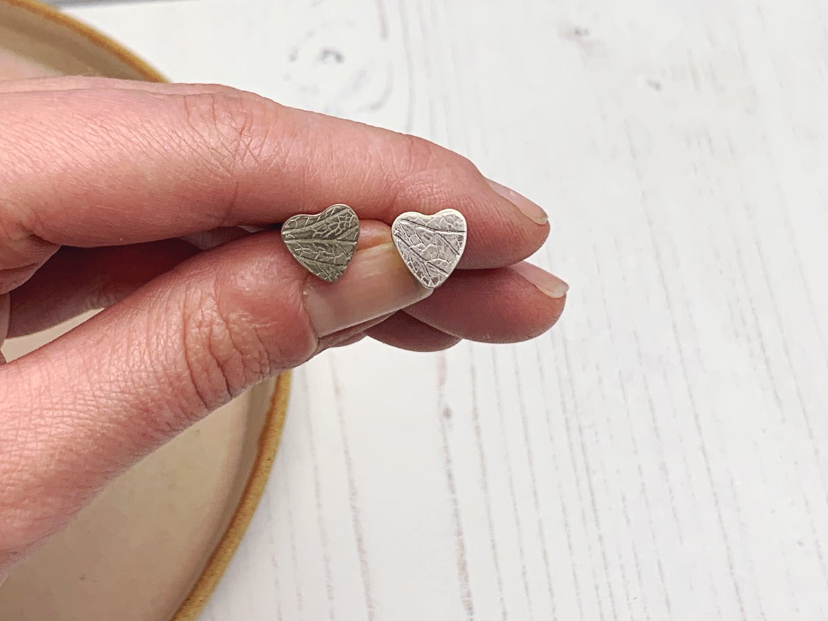 Image of Petal imprint heart studs, recycled sterling silver. 
