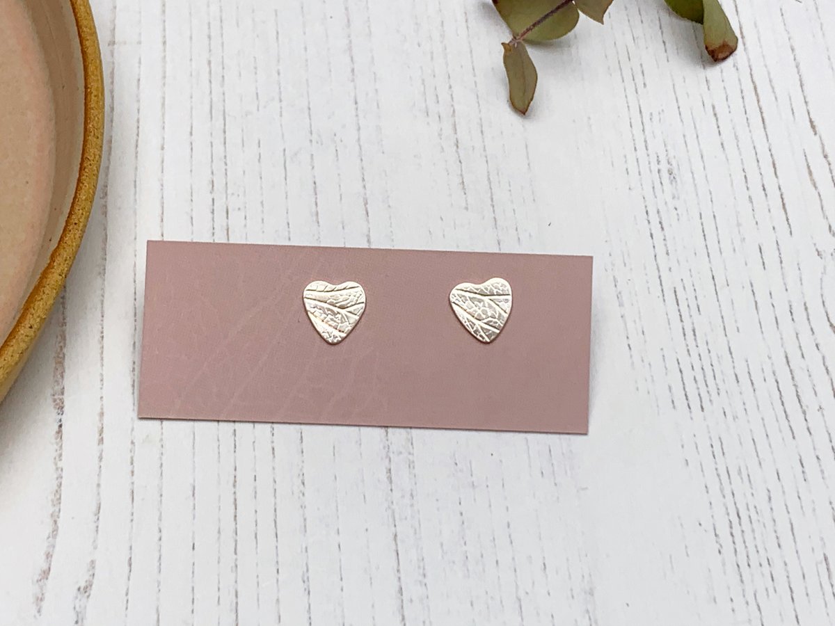 Image of Petal imprint heart studs, recycled sterling silver.
