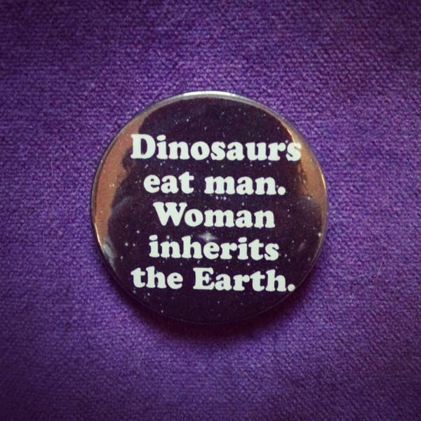 Image of badge jurassic park - woman