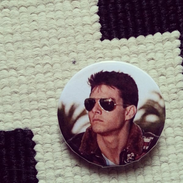 Image of badge top gun - maverick