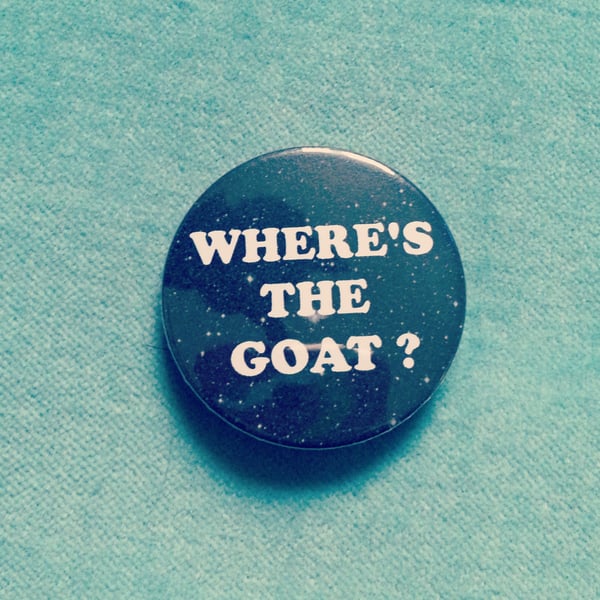 Image of badge jurassic park - goat