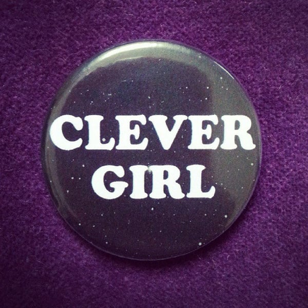 Image of badge jurassic park - clever girl