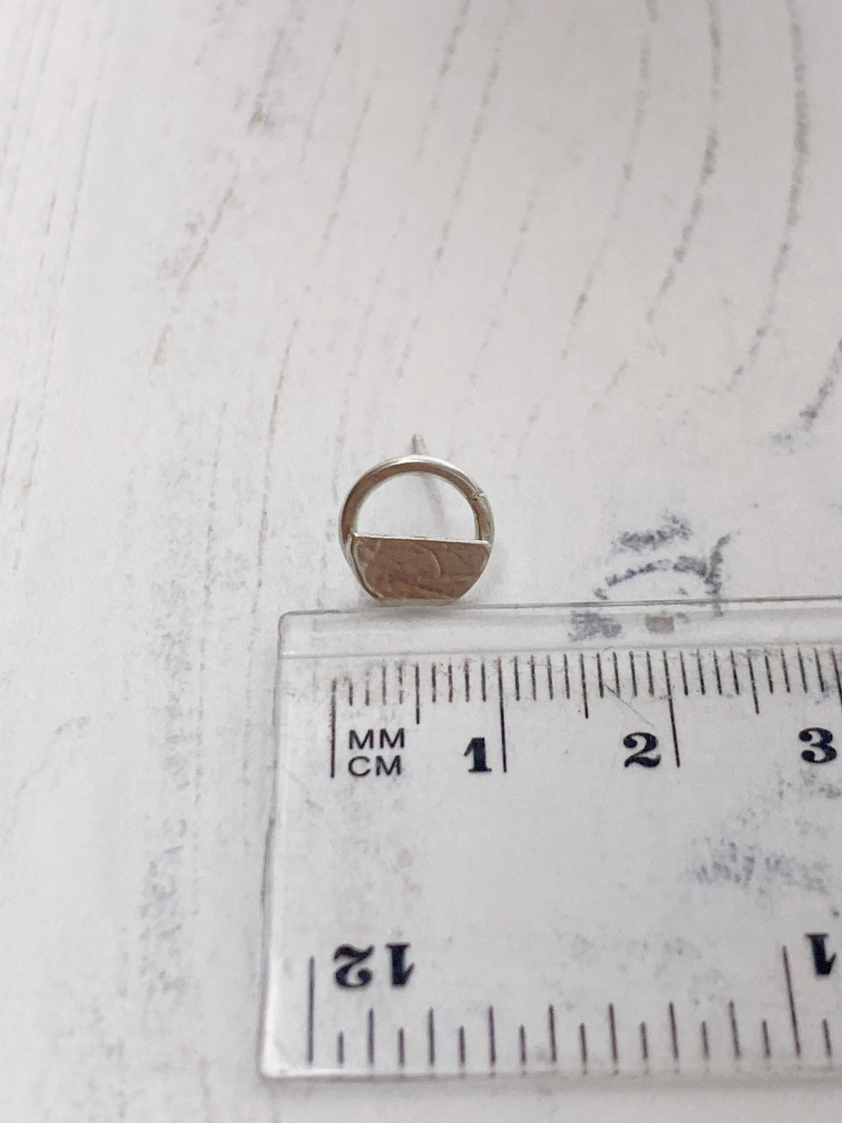 Image of Circle and semi circle stud earrings 