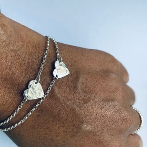 Image of Heart shaped silver bracelet with 9ct gold