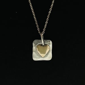 Image of Silver square hammered pendant with gold heart