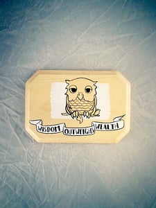 Image of A Wise Owl Tattoo - white on natural on a squared plaque