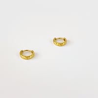 Image 1 of Tiny huggie hoop earring