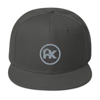 CJAK logo - Gray on Charcoal Gray