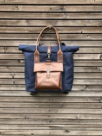 Image 2 of Convertible backpack in waxed canvas with leather outside pocket and cross body strap