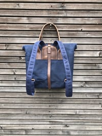 Image 3 of Convertible backpack in waxed canvas with leather outside pocket and cross body strap