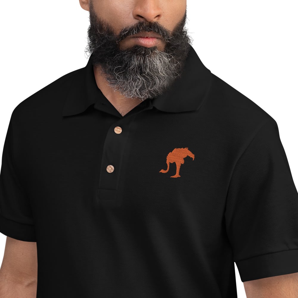 Black polo shirt store with orange horse