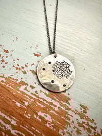 Image 19 of blue sapphire pendant with Fitzgerald quote