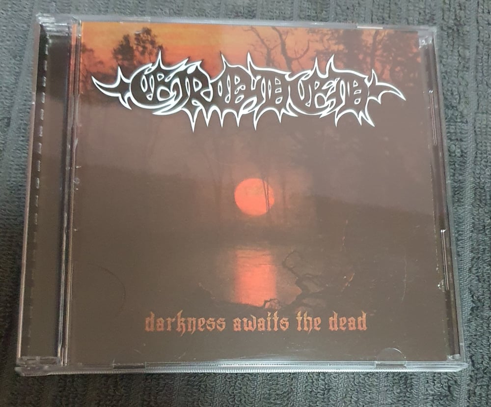 ERODED - DARKNESS AWAITS THE DEAD CD