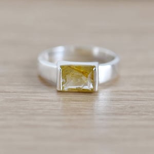 Image of Golden Rutilated Quartz rectangular cut silver flat wide band ring