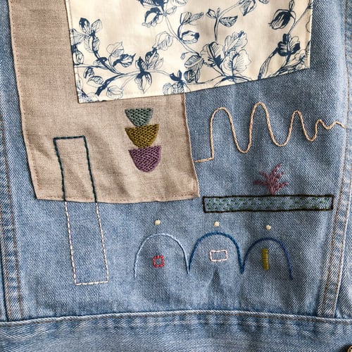 Image of Reserved for Maud: Trying to focus -original hand embroidery +textile collage on a denim jacket