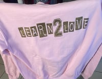 pink pullover 