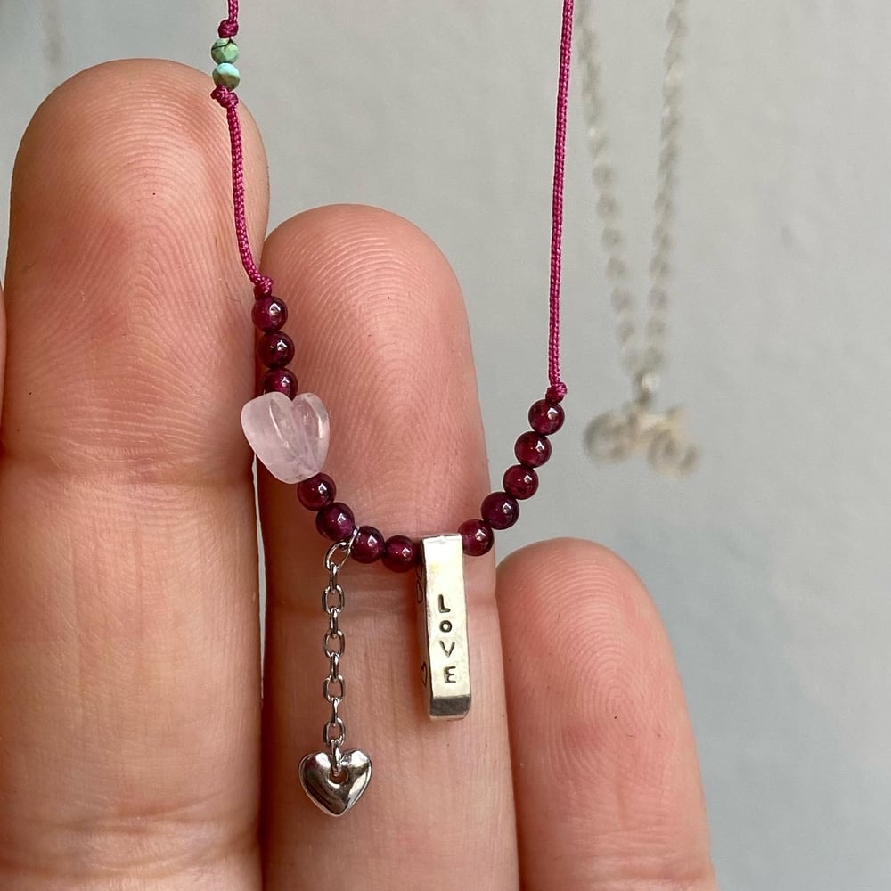 Image of Love with heart thread necklace