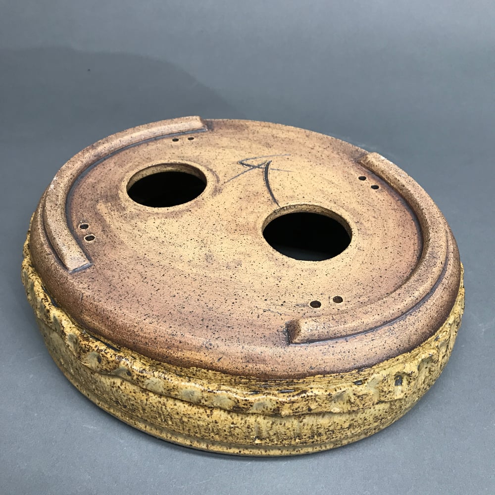 Image of 324  Oval in "Sabin's Point Ochre" ash glaze