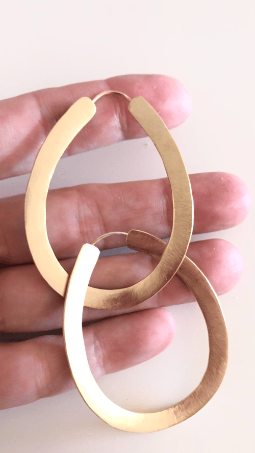 Image of Arracades Sort (plata i or).Pendientes Sort.