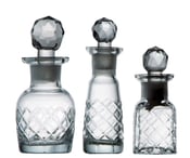 Image of etched glass perfume bottles trio