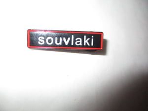 Image of SLOWDIVE Souvlaki Logo 1 1/2 Inch Wide Metal Badge