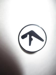 Image of Classic Aphex Twin Logo 1 Inch Round Metal Badge