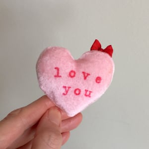 Image of Conversation Heart Pillow in Pink with LOVE YOU