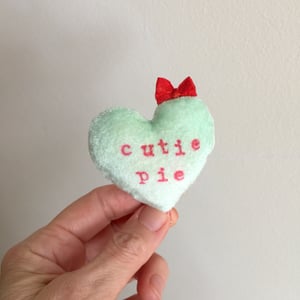 Image of Conversation Heart Pillow in Green with CUTIE PIE