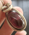 VICTORIAN 15CT HIGH CARAT LARGE CABOCHON GARNET PENDANT WITH GLASS BACK